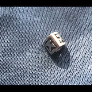 Pandora Sharm letter K